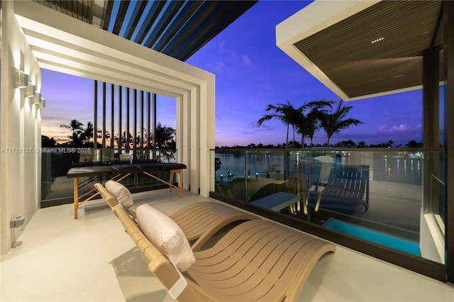315 N Shore Dr, Miami Beach, FL 33141 - balcony at dusk with a water view