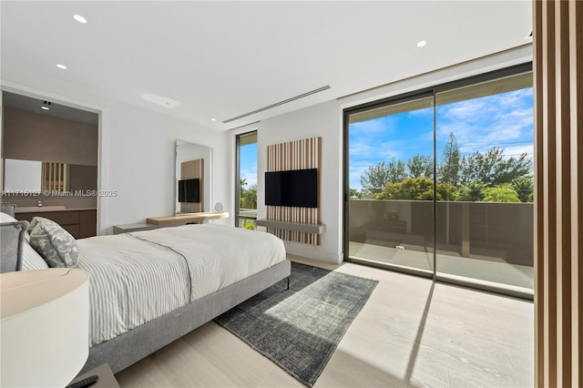 315 N Shore Dr, Miami Beach, FL 33141 - bedroom featuring recessed lighting, access to exterior, and wood finished floors