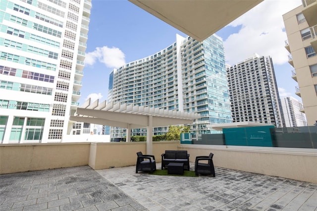 view of patio featuring a pergola and an outdoor hangout area