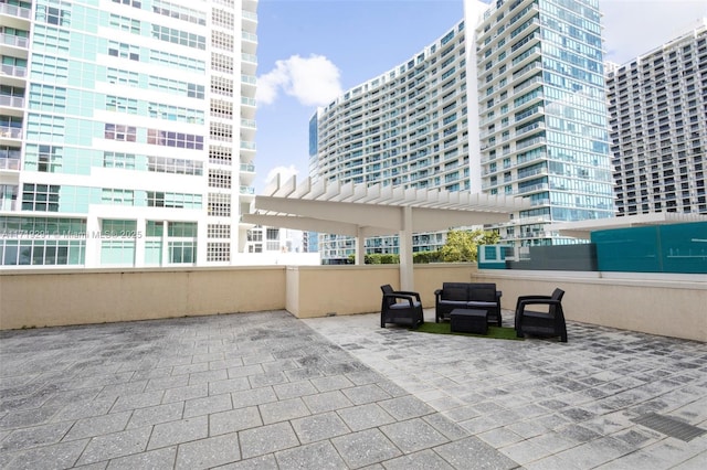 view of patio with outdoor lounge area and a pergola