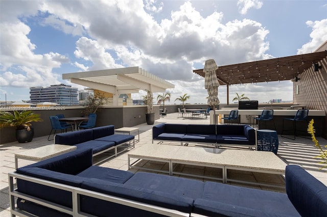 view of patio with a pergola, area for grilling, and an outdoor hangout area