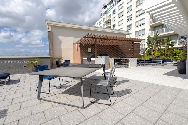 view of patio / terrace featuring a pergola