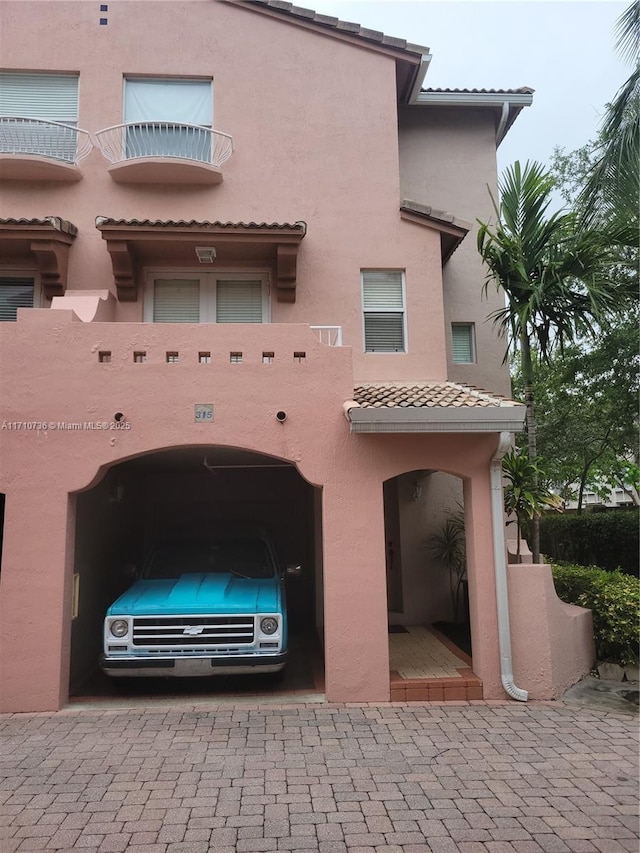 view of front of house featuring a carport