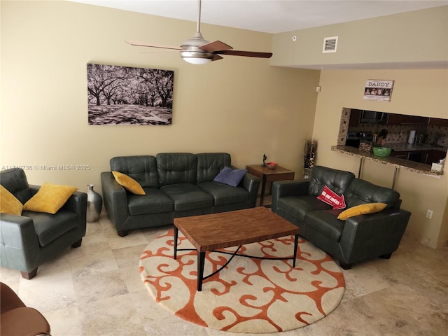 living room with ceiling fan