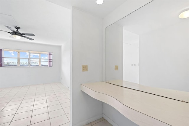 bathroom featuring ceiling fan and tile patterned floors