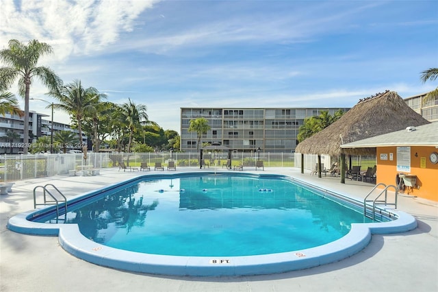 view of pool featuring a patio