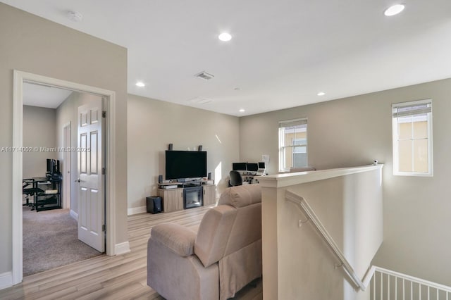 living room with light hardwood / wood-style floors