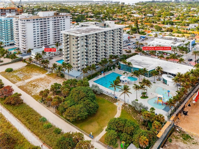 birds eye view of property featuring a city view