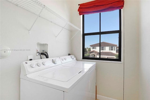 washroom featuring separate washer and dryer