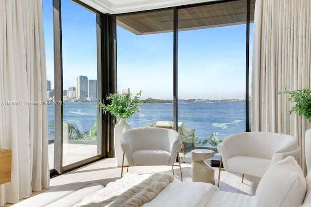 living area featuring a water view