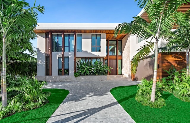 view of front of home featuring a garage and french doors