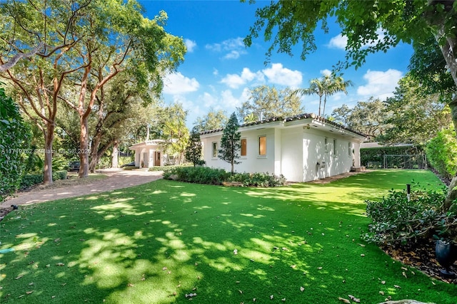 exterior space featuring a yard