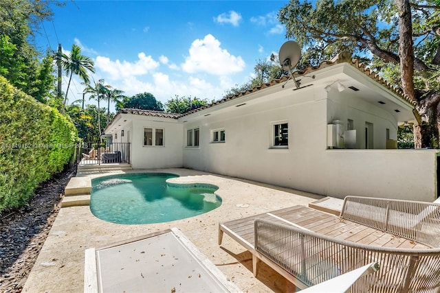 view of pool featuring a patio area