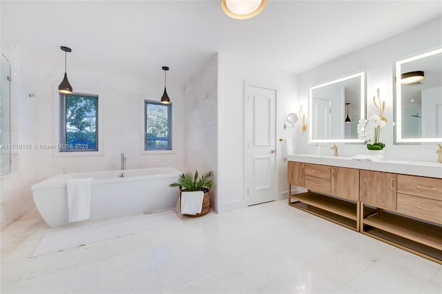 bathroom with vanity and a tub to relax in