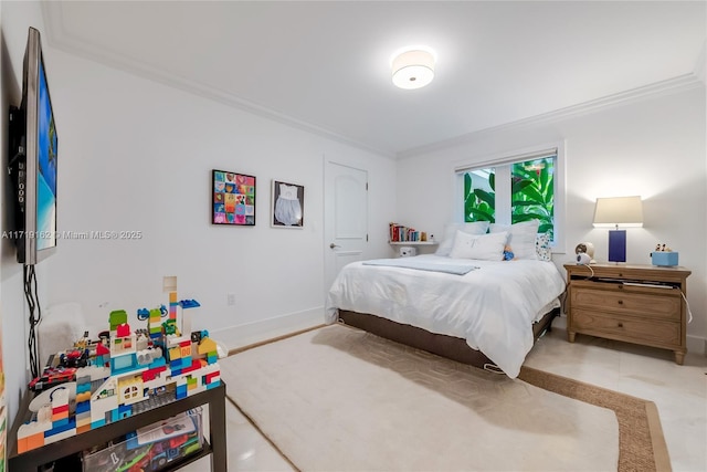 bedroom with ornamental molding