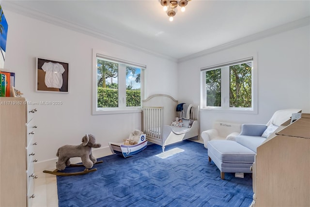 bedroom with multiple windows and ornamental molding