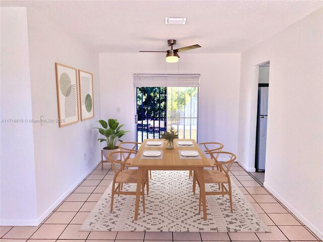 view of tiled dining space