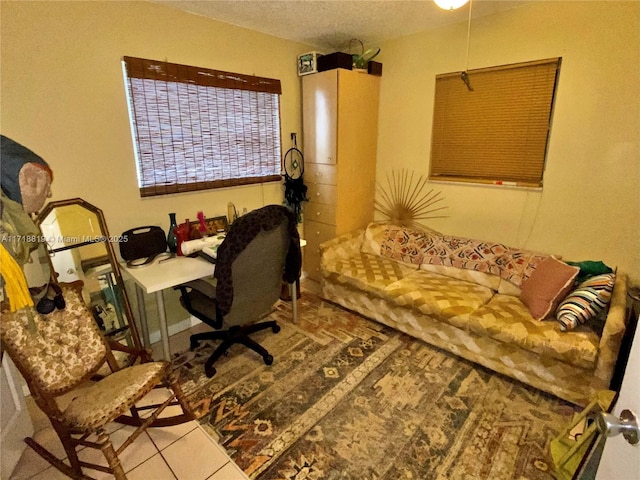 office space with tile patterned floors