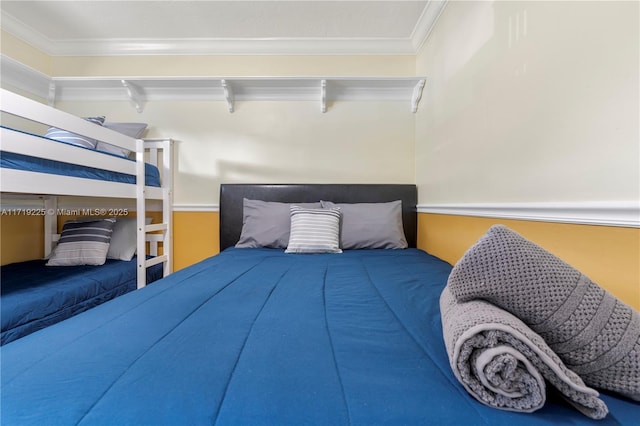 bedroom with crown molding