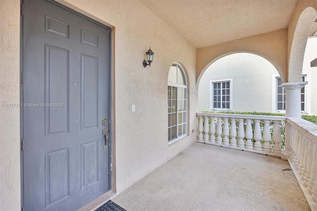 entrance to property with a porch