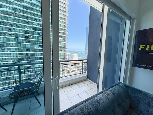 balcony featuring a water view