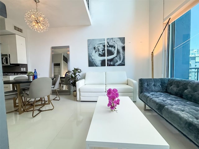 living room featuring an inviting chandelier