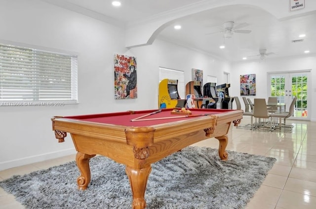 recreation room with french doors, ceiling fan, crown molding, light tile patterned floors, and pool table