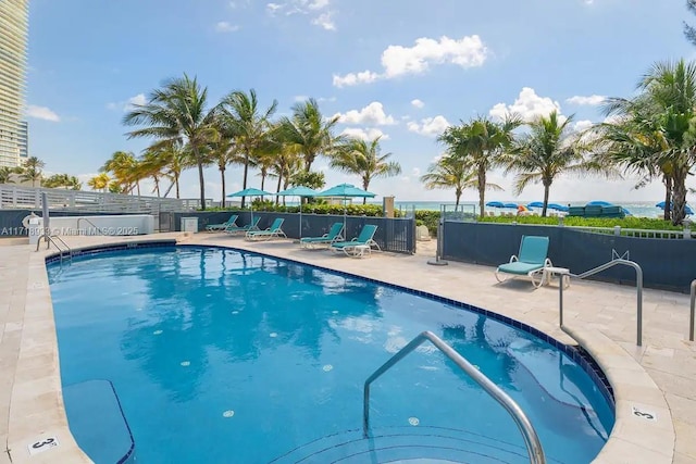 view of swimming pool featuring a patio