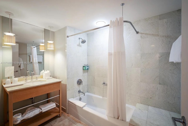 bathroom with tile patterned flooring, vanity, and shower / bath combo with shower curtain