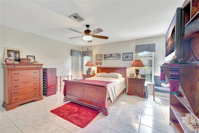 bedroom featuring ceiling fan and light tile patterned flooring