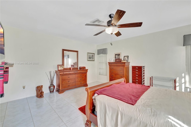 bedroom featuring ceiling fan and light tile patterned flooring