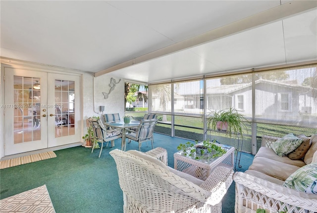 sunroom featuring french doors