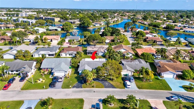 bird's eye view with a water view