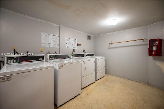 laundry area with washer and dryer