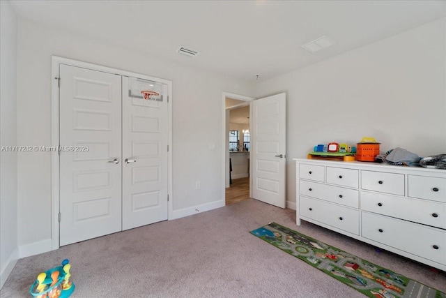 game room featuring light colored carpet