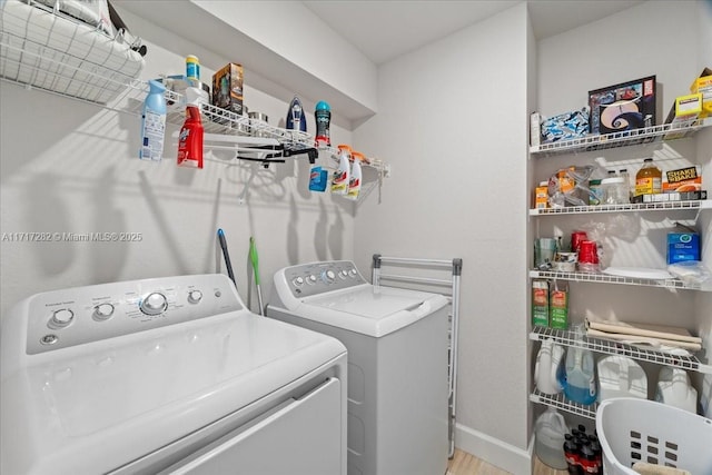 laundry room with washing machine and dryer