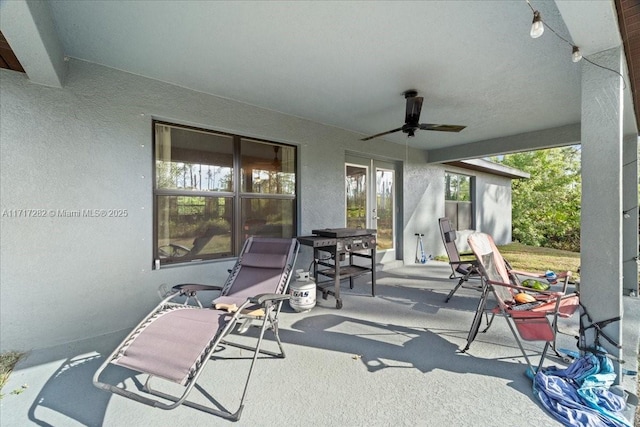 view of patio with ceiling fan