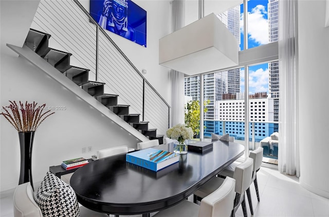 dining area with light tile patterned floors