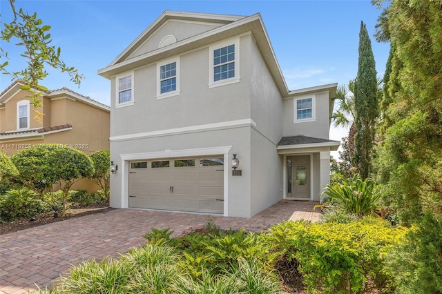 front of property with a garage