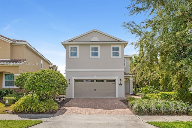 view of front of home with a garage