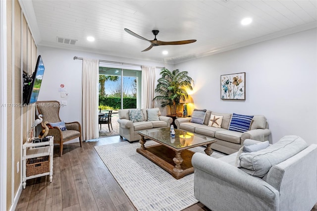 living room featuring hardwood / wood-style floors, ceiling fan, ornamental molding, and wood ceiling