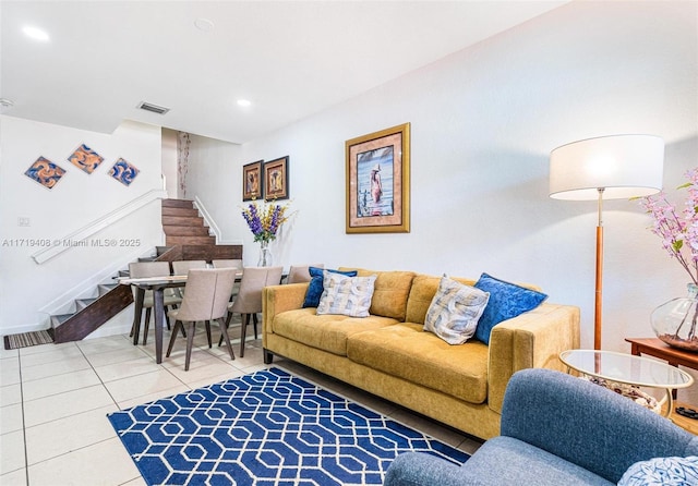 living room featuring tile patterned flooring