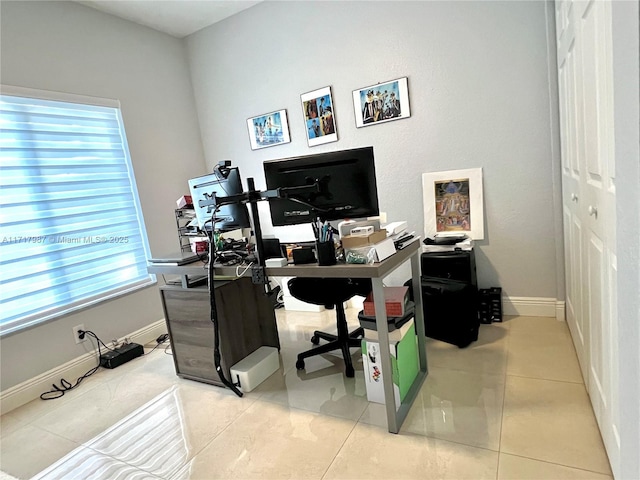 office area featuring light tile patterned floors