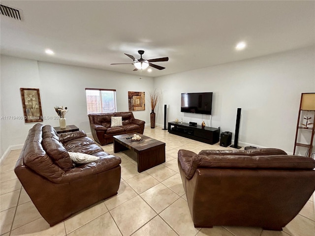 tiled living room featuring ceiling fan