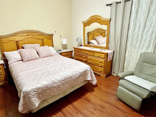 bedroom with light wood-type flooring