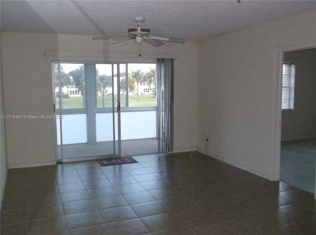 2850 W Golf Blvd Unit 215, Pompano Beach, FL 33064 - unfurnished room with ceiling fan, tile patterned flooring, and baseboards