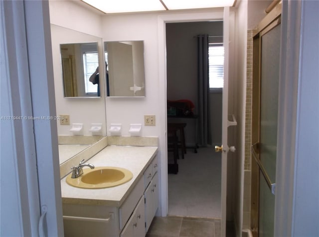2850 W Golf Blvd Unit 215, Pompano Beach, FL 33064 - full bath featuring vanity and tile patterned floors