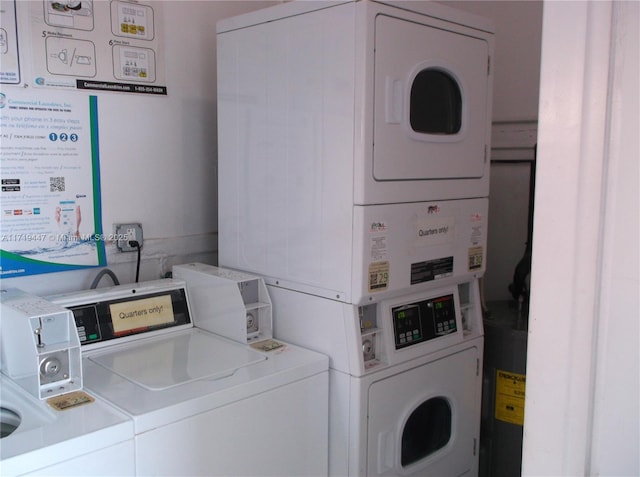 shared laundry area with stacked washer / dryer and washing machine and clothes dryer