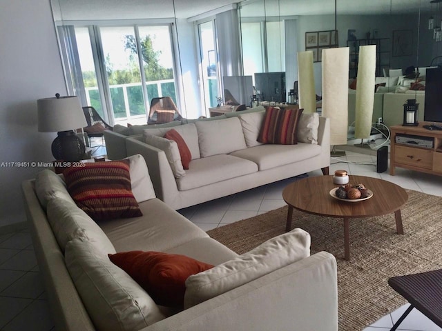 living room with light tile patterned flooring