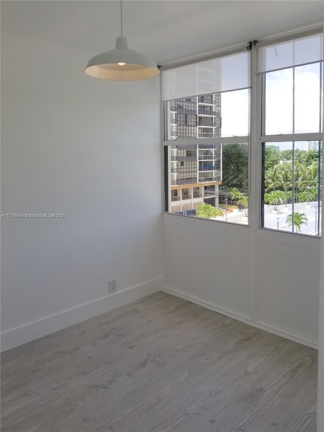 empty room featuring hardwood / wood-style floors